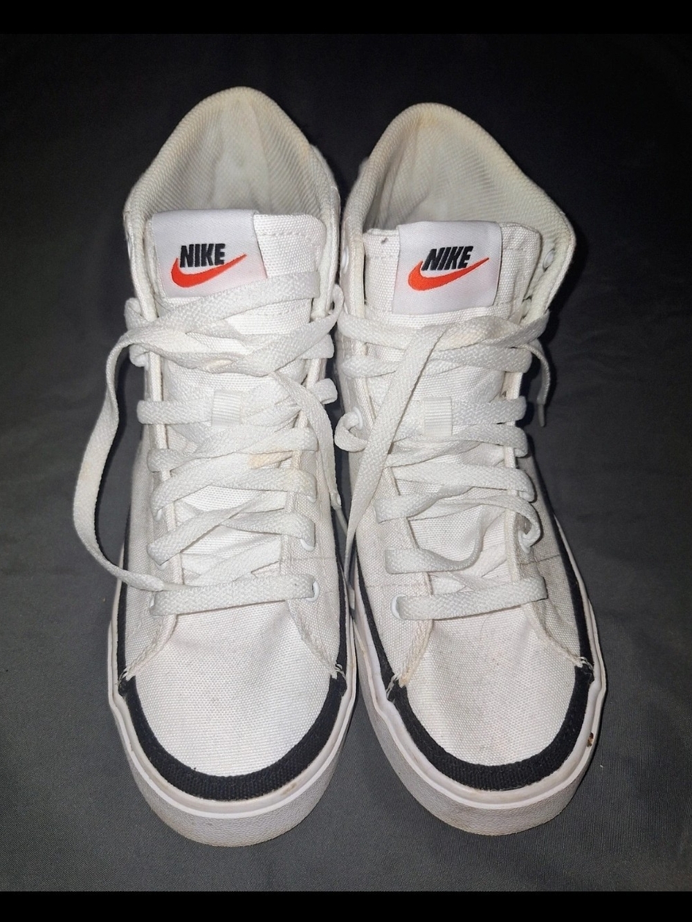 Nike White High-Top Sneakers with Orange Swoosh and Black Accent